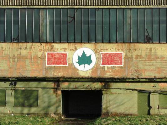 5 Sqn badge painted on a hangar at RAF Binbrook, photographed in Feb 2005.