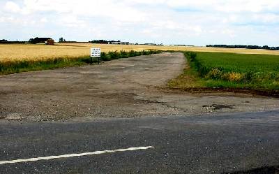 RAF Coleby Grange - Looking north from the south-west peritrack corner on the B1202 at SK999597.